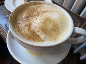 Oat milk cappuccino with vanilla syrup   at Zero Waste Hub in Edinburgh