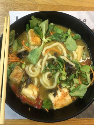 Vegan ramen bowl. They automatically replace the ramen noodles with udon. The broth is curry-based. Very tasty!!  at MXP - Wagamama - T1 in Ferno