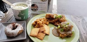 Chikn N Waffles, biscuits & gravy, cinnamon crunch donut, off menu smoothie bowl. at Lifestyle Cafe in Columbus