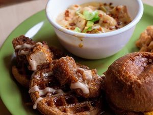 Sampler of chicken and waffles, shrimp and grits  at Lifestyle Cafe in Columbus
