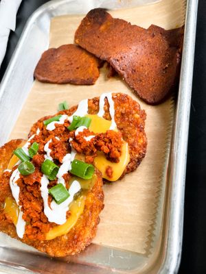 Loaded hash browns and bacun   at 4th & State in Columbus