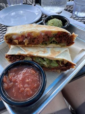Crunch wrap with a side of salsa and guacamole   at 4th & State in Columbus
