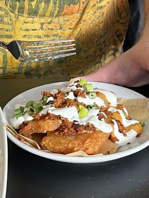 Loaded soyrizo, queso and sour cream hashbrowns at 4th & State in Columbus