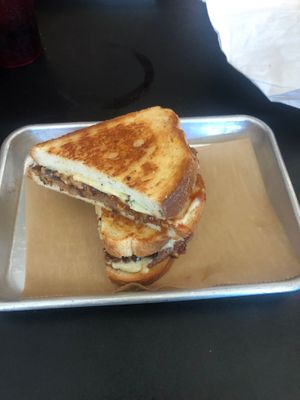 Big Island melt-sautéed red onion, provolone, tempeh bacon, pineapple, bbq glaze, and ranch at 4th & State in Columbus