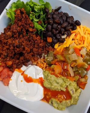 burrito bowl with some hot sauce at 4th & State in Columbus