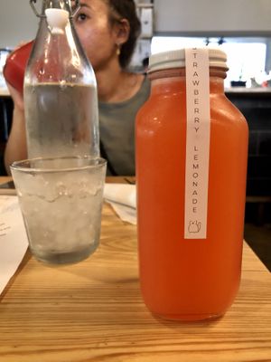 Strawberry lemonade - glass reusable container at Bearcat Cafe - CBD in New Orleans