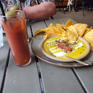 Vegan bloody Mary & vegan queso. at Bearcat Cafe - CBD in New Orleans
