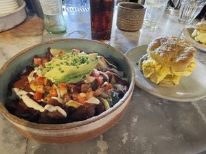 Vegan breakfast potatoes and vegan biscuit sandwich   at Bearcat Cafe - CBD in New Orleans