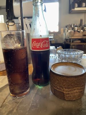 Mexican Coke and oat maple syrup latte   at Bearcat Cafe - CBD in New Orleans