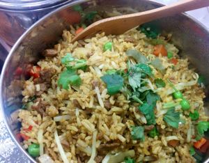 Guru fried rice: steamed rice, non-gmo soy protein, carrots, green peas, onion, bean sprouts, spicy curry, cilantro. at Loving Hut in Houston