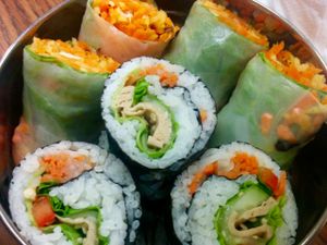 Arigato sushi: rice, non-gmo soy, carrots, sesame seed, seaweed, lettuce, cucumbers. Spring rolls: rice paper wraps, jicama, carrots, lettuce, non-gmo tofu, onion, roasted peanuts. at Loving Hut in Houston