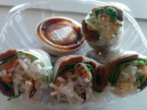 BBQ rolls with dipping sauce. Good for travel/takeout at Loving Hut in Houston