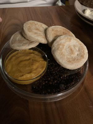 blinis with beluga lentils and pumpkin cream  at Leuchtendroter in Frankfurt