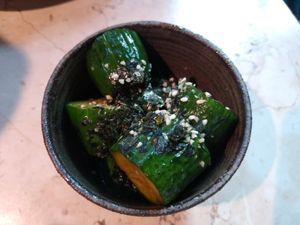 Cucumber with nori flakes in soy sauce at Leuchtendroter in Frankfurt