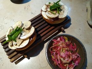 Brioche buns topped with mushrooms and a clever salty spread at Leuchtendroter in Frankfurt