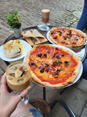 Vegan pizza, vegan foccacia, iced coffee with soy milk & vegan hot chocolate at Juliet  in Liepaja
