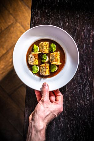 Jerusalem artichoke, salsify, Périgord truffle sauce and young spinach at Lafleur in Frankfurt