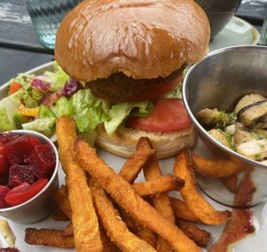 Beetroot and quinoa burger with sweet potato fries at Caffi Lolfa in Burry Port