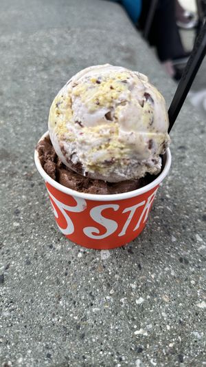 Base scoop of Death by Chocolate Chocolate Cake topped with a scoop of Chocolate Passionfruit Truffle  at Downtown Disney - Salt & Straw in Anaheim