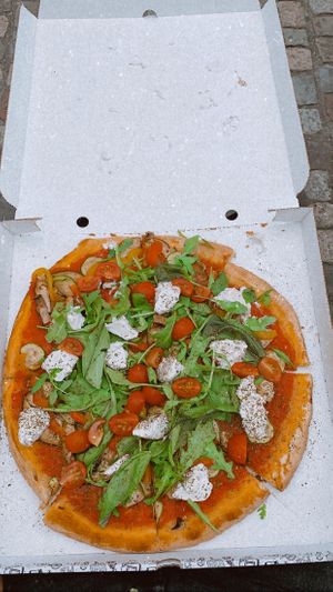 super good pizza with almond cheese  at Pizza Nation in Zurich