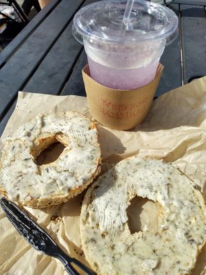 Everything bagel with roasted herb vegan spread, and lavender lemonade at Big Bon Bodega in Savannah