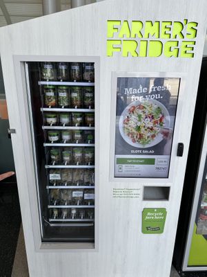 Kiosk-Vending machine. All ingredients are listed within the item menu (right screen)    at ORD - Farmers Fridge - T3 in Chicago