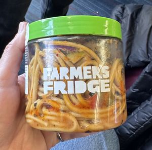 Thai Noodle Bowel. Gets pretty ‘hot’ towards the bottom, but tasty    at ORD - Farmers Fridge - T3 in Chicago