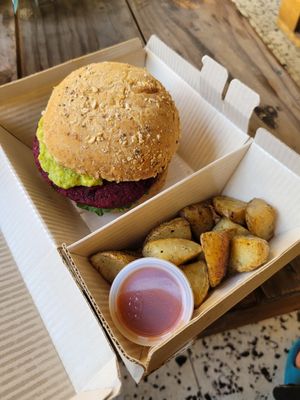 Avo Burger con papas at Smash Avocaderia y Cafe in Medellin