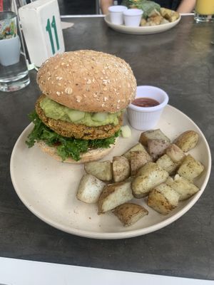 Great burger, undercooked potatoes!  at Smash Avocaderia y Cafe in Medellin