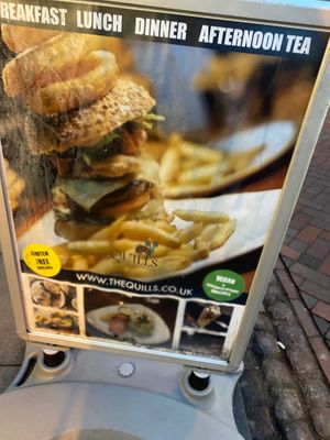 Vegan options clearly displayed on sandwich board at The Quills in Rochester