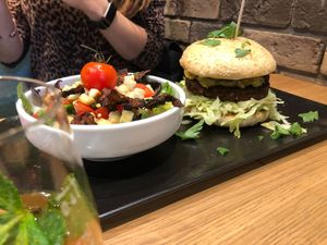 Bean butcher burger and Caesar side salad   at King of Greens in Leonberg