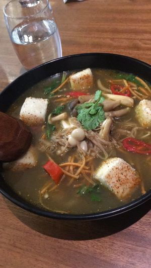 Kare burosu ramen: 
shichimi-coated silken tofu and grilled mixed mushrooms on a bed of udon noodles in a curried vegetable broth. Amazing! at Wagamama - Marina Mall in Dubai