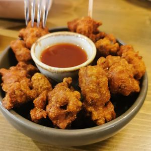 Cauliflower popcorn. Ritchie loved it. A bit too peppery for my taste, but I still ate some. at The Goat - Maybe closed in Timsbury