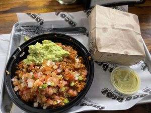 Burrito bowl with impossible adobo served with chips - very yummy, filling portion   at Taco Bros in Wyandotte