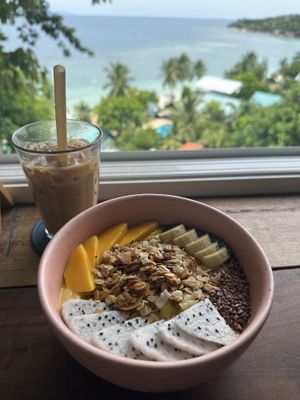 Iced oat milk coffee and mango bowl  at What's Cup! in Koh Phangan