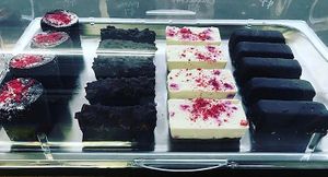 Brownie, salted caramel, almond & cashew bar, raspberry & lime cheesecake, chocolate coconut bar at Little Green in Raglan