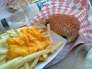 Cheesy frites with burger at Furahaa - Vegan in Paris