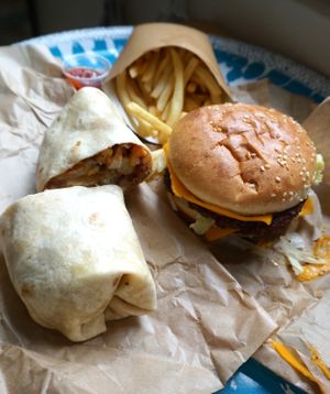 Burrito and Big Furahaa burger (delivery) at Furahaa - Vegan in Paris