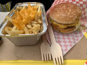 Burger and cheese fries  at Furahaa - Vegan in Paris