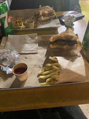 Cheeseburger and double cheeseburger with fries   at Furahaa - Vegan in Paris