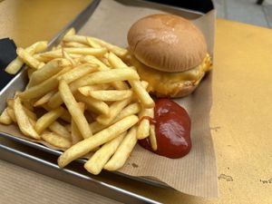 Double cheeseburger with fries  at Furahaa - Vegan in Paris