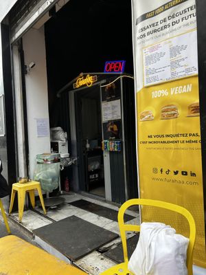 From sitting at the table, the entrance  at Furahaa - Vegan in Paris