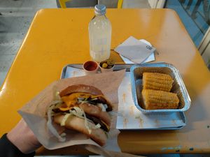 Delicious burger, great corn, spicy sauce and jalapeños at Furahaa - Vegan in Paris