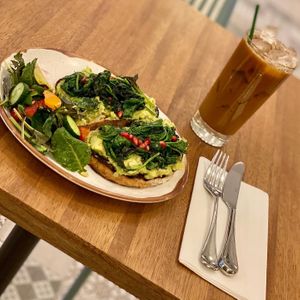 Avocado toast with sautéed spinach and pomegranate. Had amazing flavor   at Truth & Tonic in Las Vegas