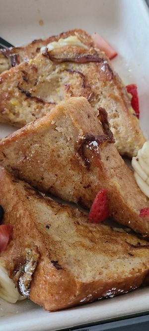 Vegan French Toast topped with strawberries and bananas at Truth & Tonic in Las Vegas