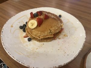 Seasonal Whole Grain & Hemp Seed Pancakes minus one I ate.  at Truth & Tonic in Las Vegas