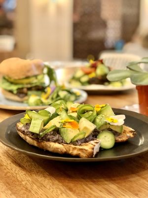Avocado and black bean toast on house made ciabatta at Truth & Tonic in Las Vegas