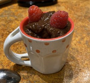 In-store made chocolate pudding in a tiny cup. Love it   at Loma House Vegetarian Express in Edmonton