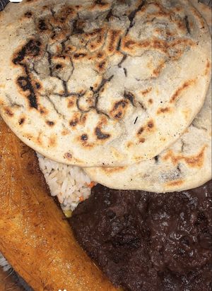 Plato Tipico (black bean pupusas, fried plantain, and rice)  at Rinconcito Salvadoreño in Port Chester