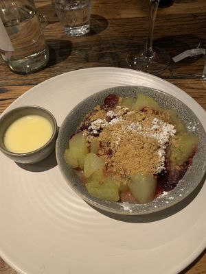 Blackberry and Apple crumble with vegan cream. It lacked flavor    at Brasserie Blanc in South East London